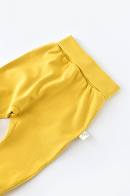Pantaloni Bebe Unisex din bumbac organic Galben deschis BabyCosy