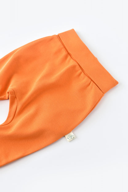 Pantaloni Bebe Unisex din bumbac organic Portocaliu BabyCosy