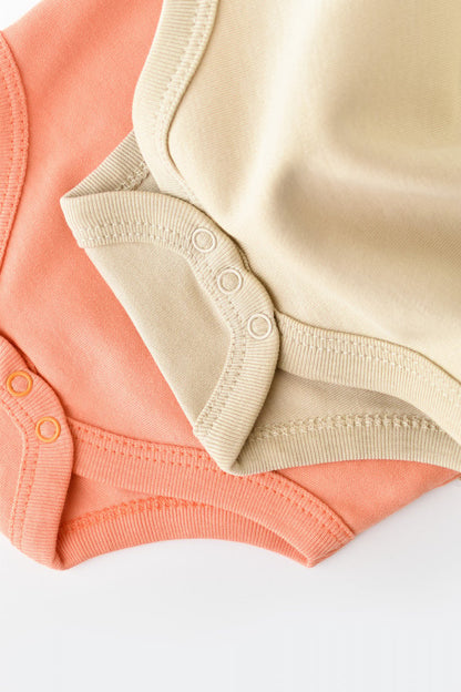 Set 2 body-uri bebe unisex -100% bumbac organic - Roz/Crem, BabyCosy