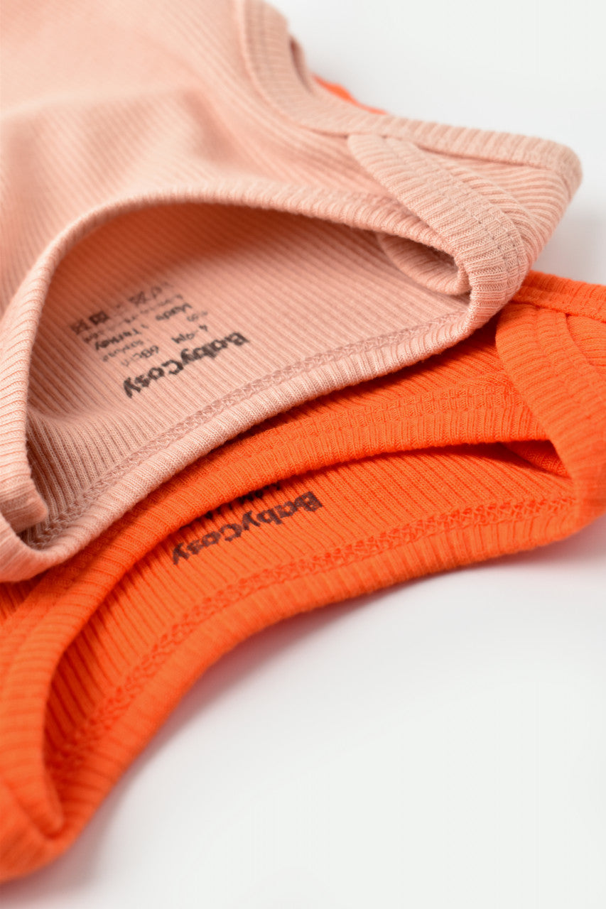 Set 2 body-uri fara maneci bebe unisex din bumbac organic si modal - Rodie/Piersica, BabyCosy