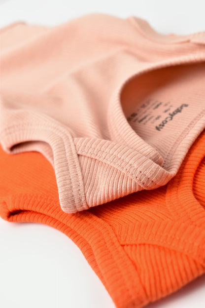 Set 2 body-uri fara maneci bebe unisex din bumbac organic si modal - Rodie/Piersica, BabyCosy